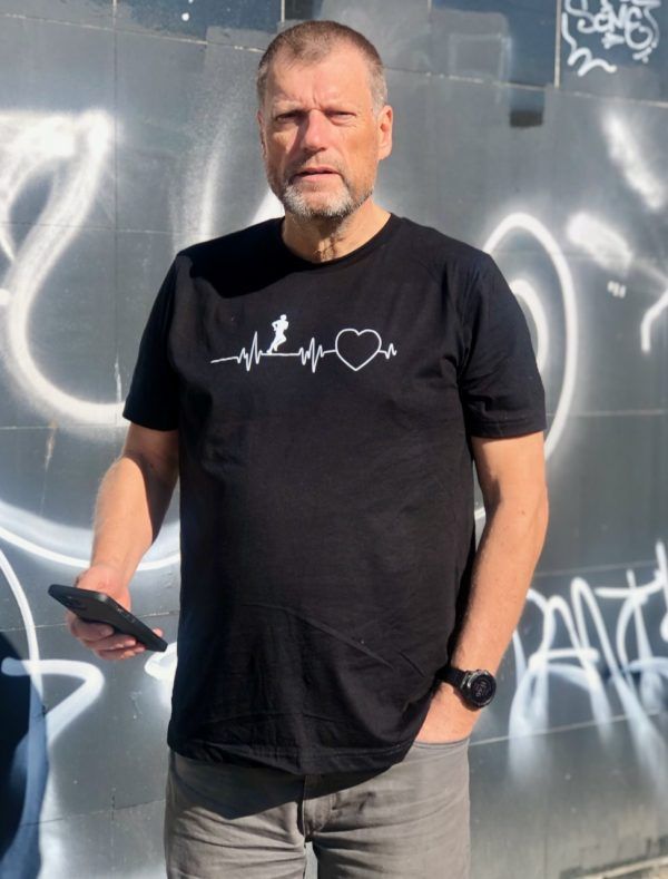 Man wearing Garmin watch wearing Running Heartbeat Tshirt